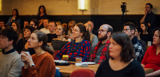 Board of Variance meeting, Vancouver City Hall, with citizens looking on.