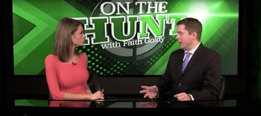 Conservative Party leader Andrew Scheer appearing on extremist Faith Goldy's Rebel Media show.