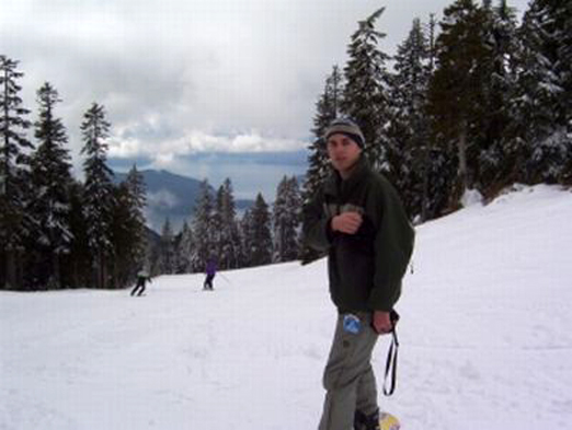 Jude Nathan Tomlin, snow boarding up on Grouse Mountain