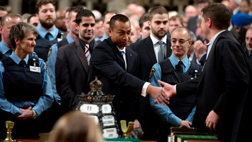 Members of Canada's Parliament honour the security detail that saved them