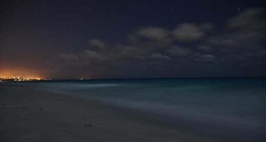 Going for a naked night swim under a near full moon in the tiny village of La Peñita, in Mexico